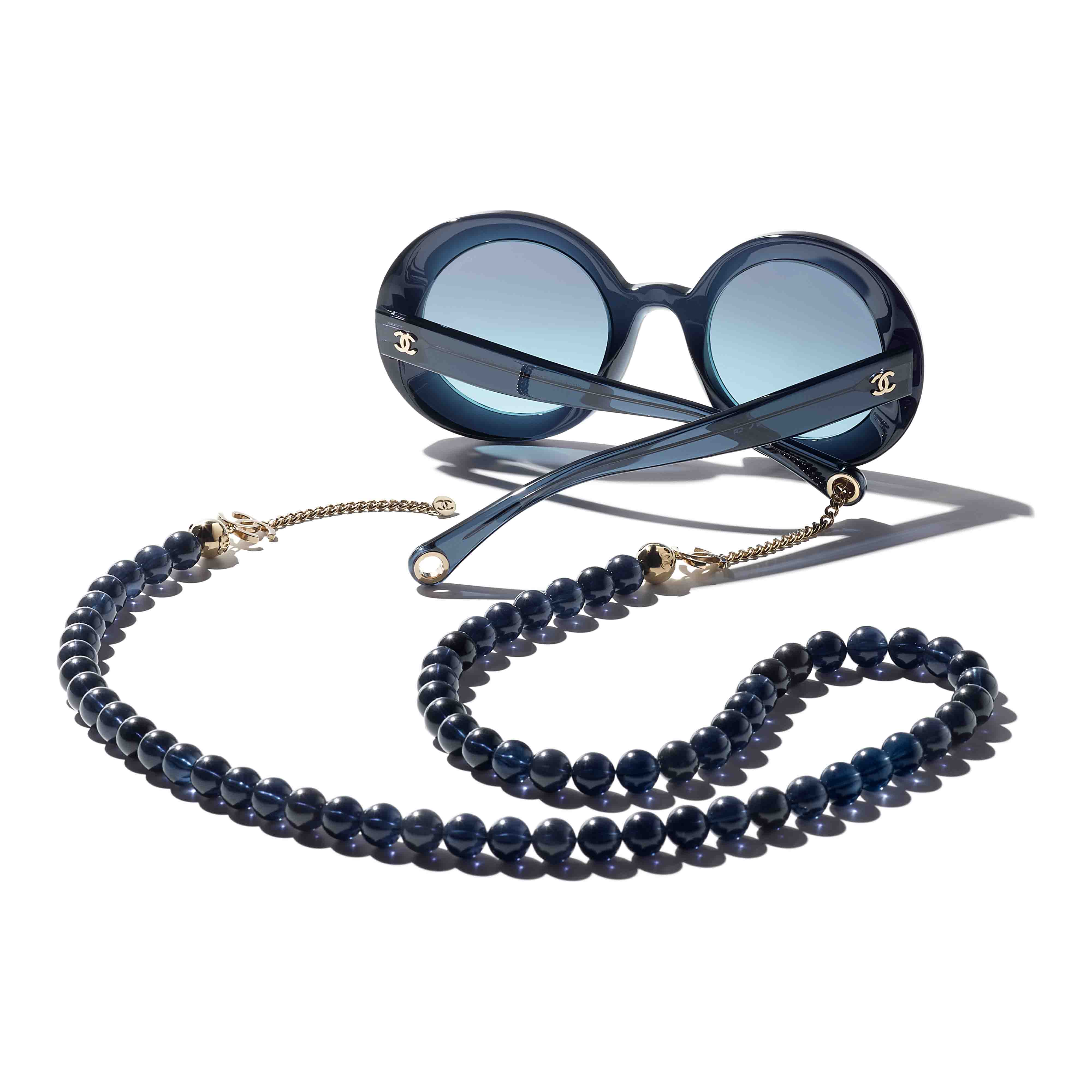 Chanel round hotsell sunglasses with chain